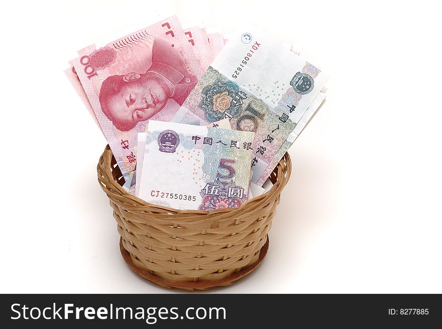 It is chinese bills in basket. isolated.
