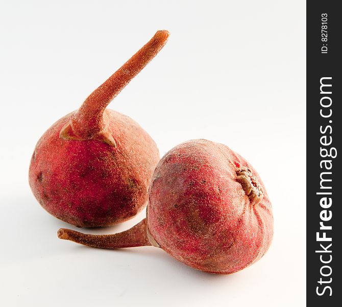 Still of a pair fresh figs on white background. Still of a pair fresh figs on white background