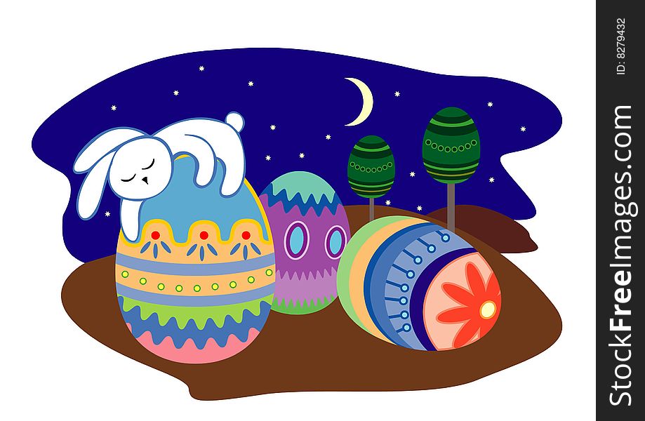 Easter bunny sleeping on an egg