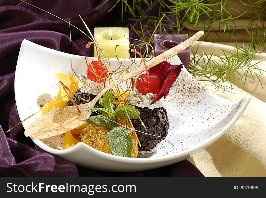 Chocolate dessert, decorated saccharine fruit