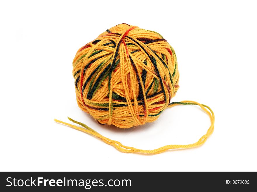 Yellow wool ball isolated on a white