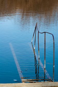 Rusty Staircase Going Nowhere In The Water Stock Images Rusty Staircase Going Nowhere In The Water Stock Images