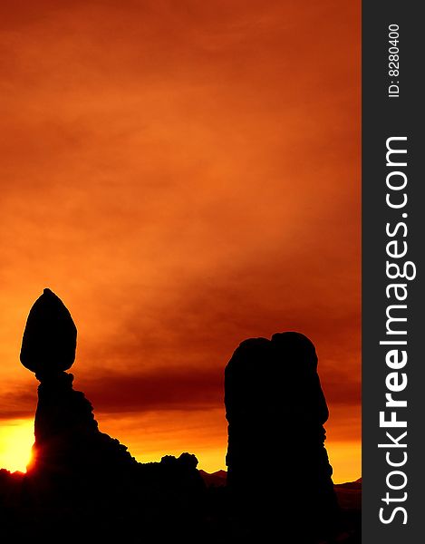 Famous Balanced Rock at Arches National Park at sunrise- Vertical image. Famous Balanced Rock at Arches National Park at sunrise- Vertical image