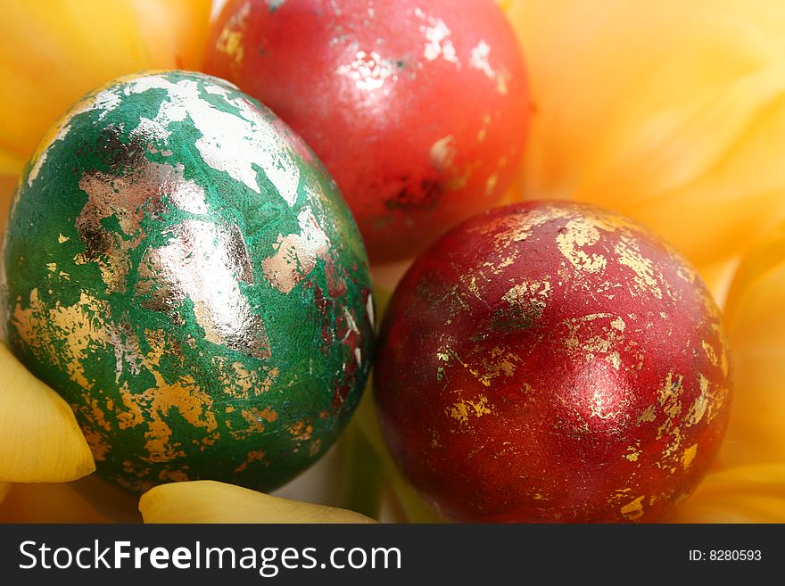 Easter colored eggs and yellow tulips. Easter colored eggs and yellow tulips