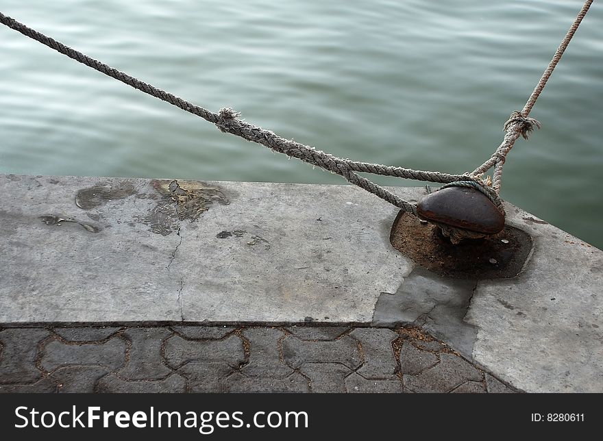 Hook and ship rope. Ship mooring