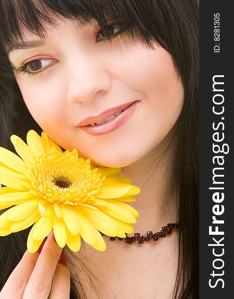 Young woman with gerber flower. Young woman with gerber flower