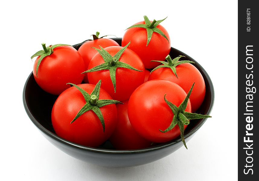 Tomatoes in a black bowl. Tomatoes in a black bowl