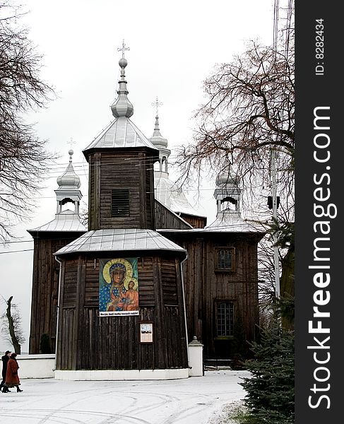 Lumber catholic church in winter - Poland, Mnichow. Lumber catholic church in winter - Poland, Mnichow