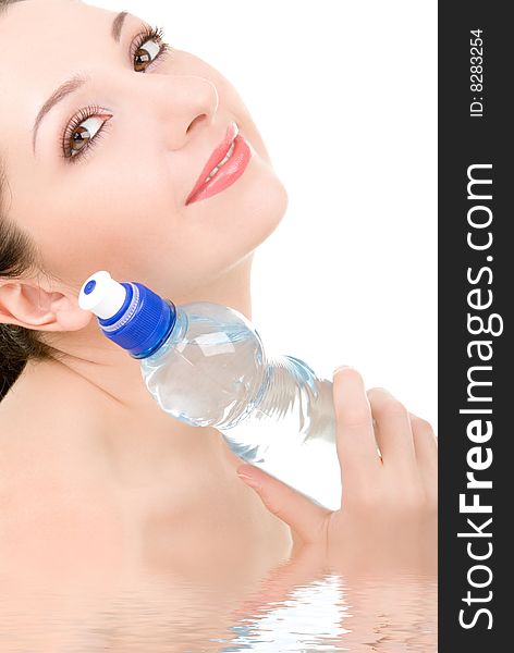 Pretty woman with bottle of clean water