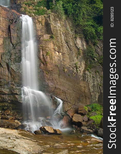 Waterfall in rainforest in Srilanka. Waterfall in rainforest in Srilanka.