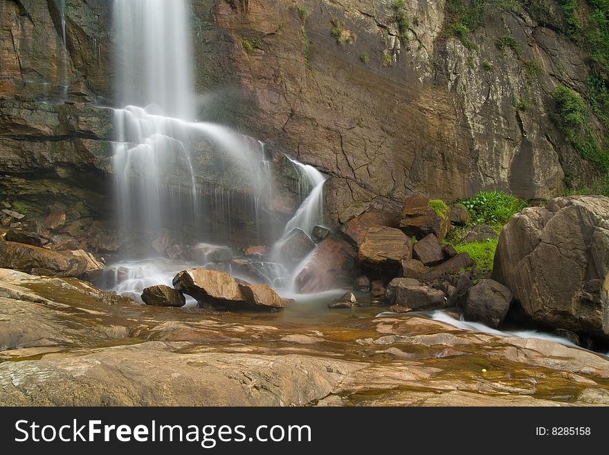 Waterfall in rainforest in Srilanka. Waterfall in rainforest in Srilanka.