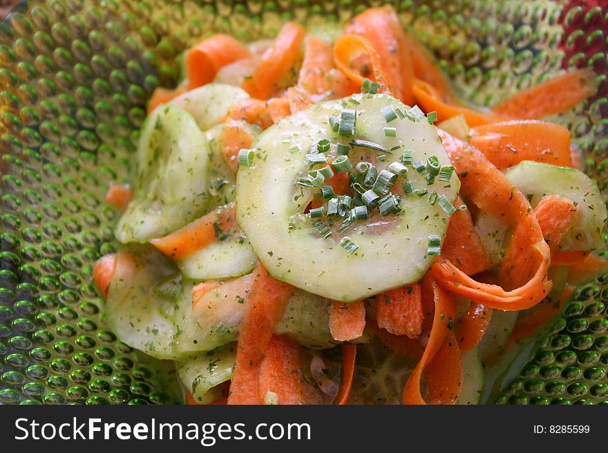 A fresh salad of cucumbers and carrots