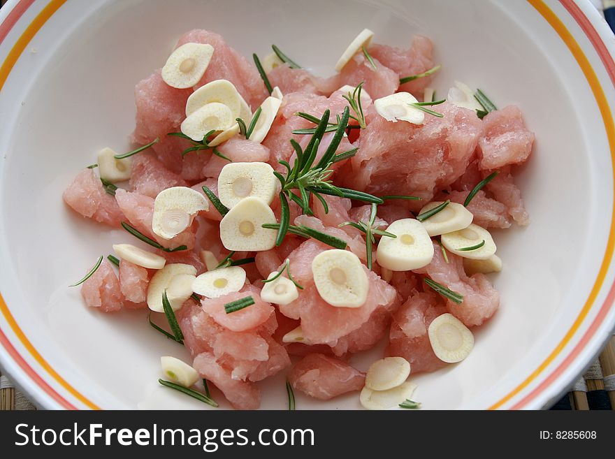 Fresh chicken meat with garlic and rosemary. Fresh chicken meat with garlic and rosemary