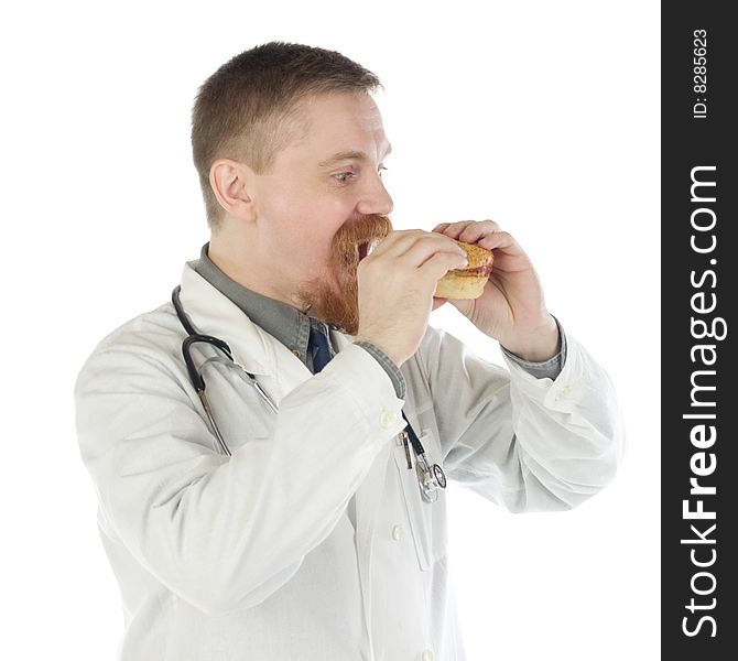 Bearded doctor opens his mouth to eat a hamburger in hands. Bearded doctor opens his mouth to eat a hamburger in hands