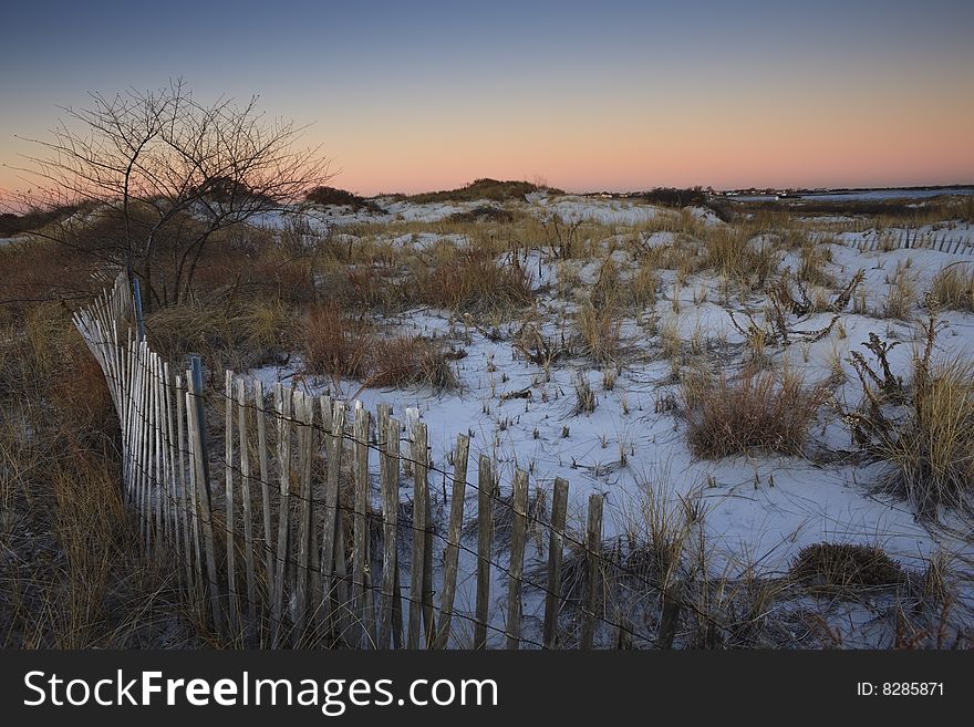 Snowy Sand Dunes At Sunrise