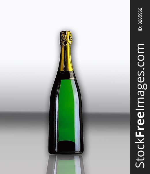 Bottle of champagne on a white background with a reflection
