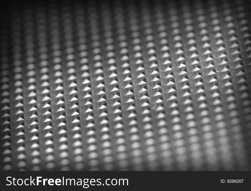 Fine close up image of metal dotted plate background. Fine close up image of metal dotted plate background