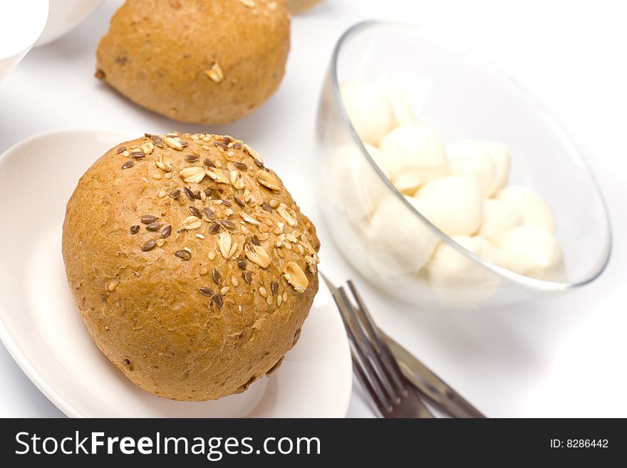 Bread and mozzarella closeup on white