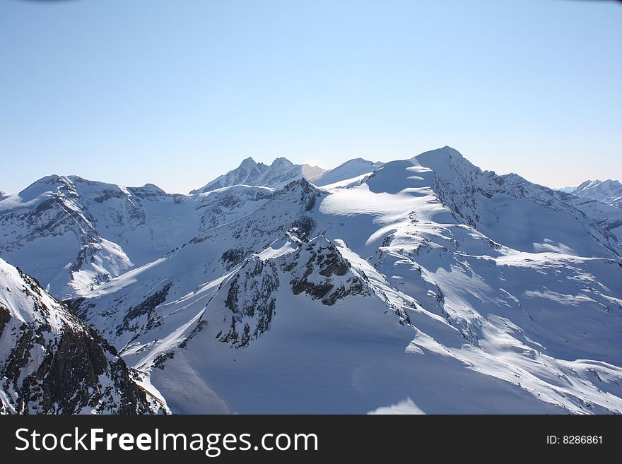 Austria. Mountains. The Alpes.Snow. The sun.