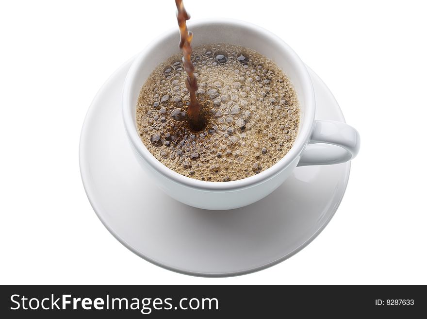 Coffee being poured into a white cup on a saucer,  isolated against white background. Coffee being poured into a white cup on a saucer,  isolated against white background