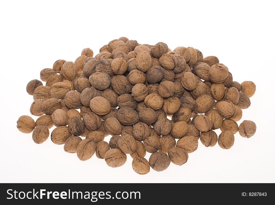 Pile of velnuts on white background