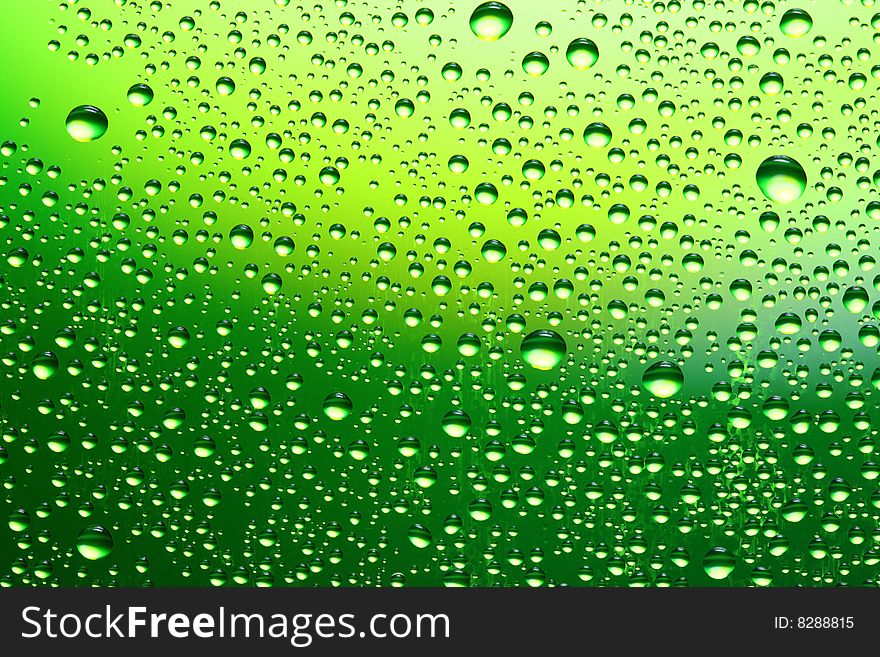 Drops of water on a green background. Drops of water on a green background.