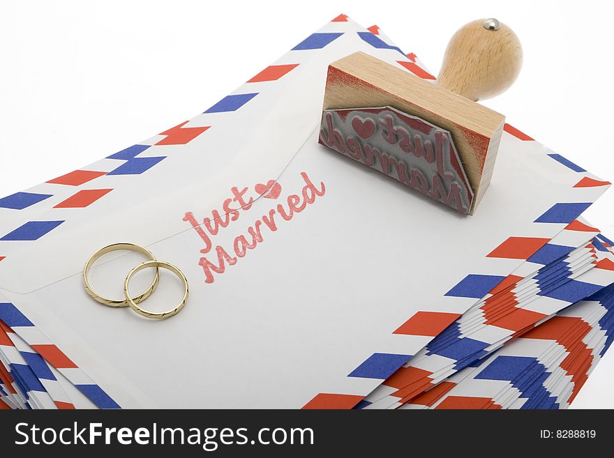 Just married, announcement with a stamp on envelope