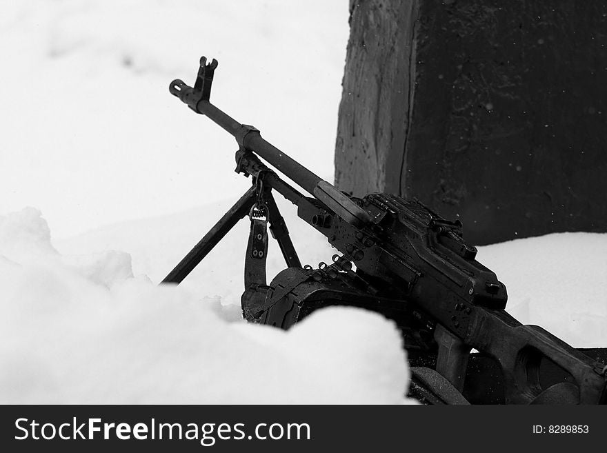 Weapon emplacement: russian army machinegun on snow ready to fire