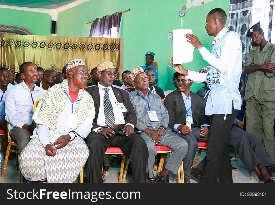 Electoral official briefs delegates during the electoral process to choose members of the Lower House of the Federal Parliament in Cadaado, Somalia on November 28, 2016. AMISOM Photo. Electoral official briefs delegates during the electoral process to choose members of the Lower House of the Federal Parliament in Cadaado, Somalia on November 28, 2016. AMISOM Photo