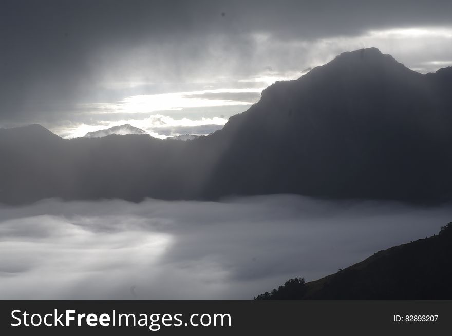 Mountains And Valley In Fog
