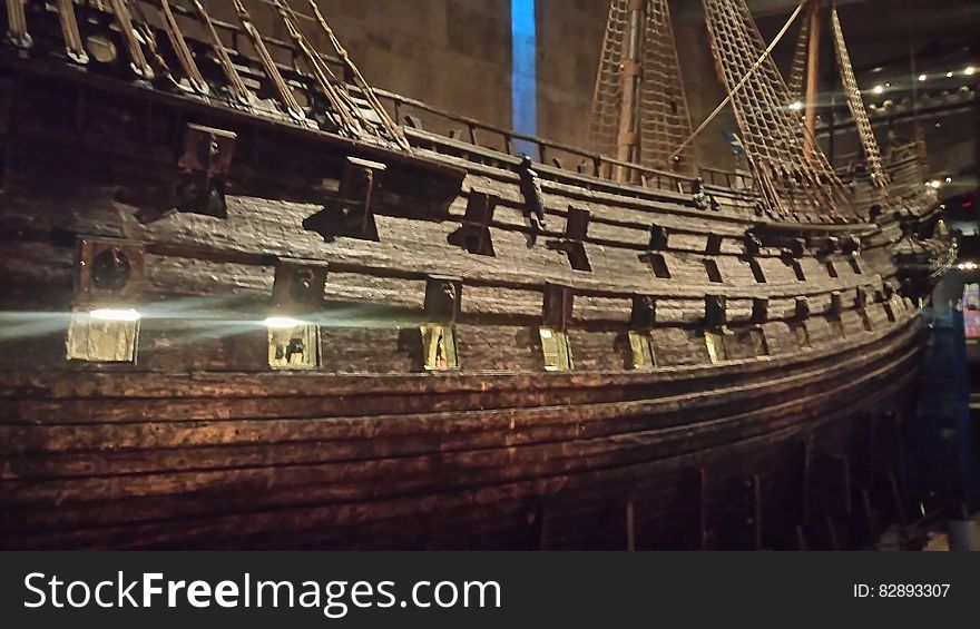 Wooden antique ship inside museum. Wooden antique ship inside museum.