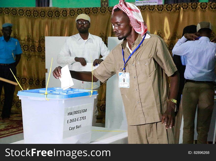 A Delegate votes during the electoral process to choose members of the House of the People in Cadaado, Somalia on December 06, 2016.AMISOM Photo. A Delegate votes during the electoral process to choose members of the House of the People in Cadaado, Somalia on December 06, 2016.AMISOM Photo