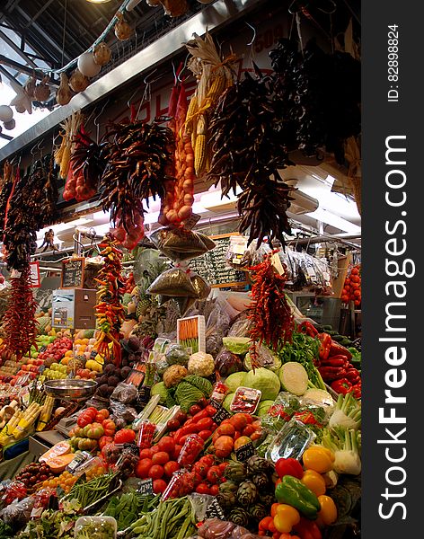 Produce stand in market with fresh fruits and vegetables in Barcelona, Spain. Produce stand in market with fresh fruits and vegetables in Barcelona, Spain.