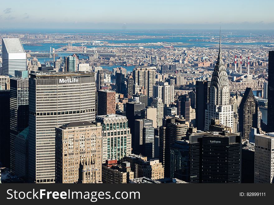 Aerial view of urban skyline with MetLife building on sunny day. Aerial view of urban skyline with MetLife building on sunny day.