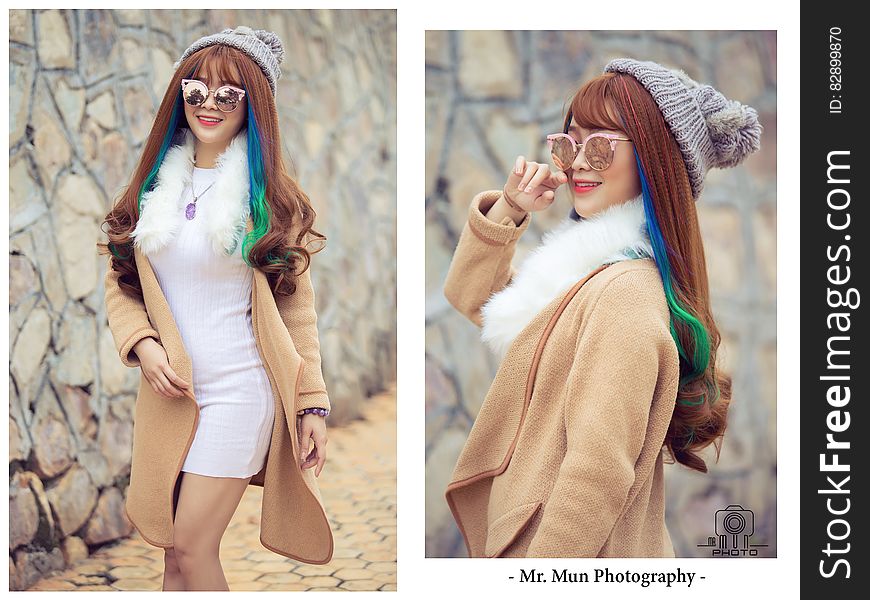 Glamorous model in white dress, tea cozy hat and camel colored coat with red hair but with streaks of blue and green, posing in frontal and oblique shots with wall behind. Glamorous model in white dress, tea cozy hat and camel colored coat with red hair but with streaks of blue and green, posing in frontal and oblique shots with wall behind.