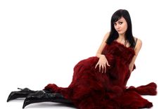 Brunette Is In A Red Fur Coat Stock Photography Brunette Is In A Red Fur Coat Stock Photography