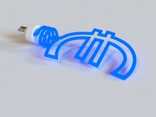 Energy Saving Lamp In The Shape Of The Euro Royalty Free Stock Photos