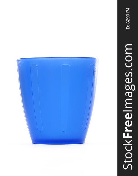 Colorful plastic cups and dish