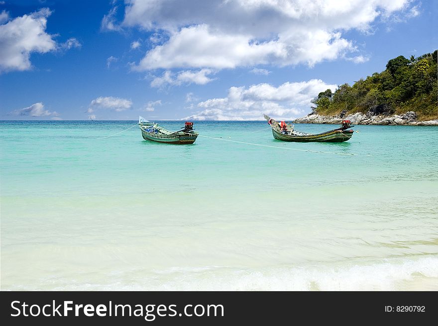 Andaman sea with longtail boats with blue sky. Andaman sea with longtail boats with blue sky