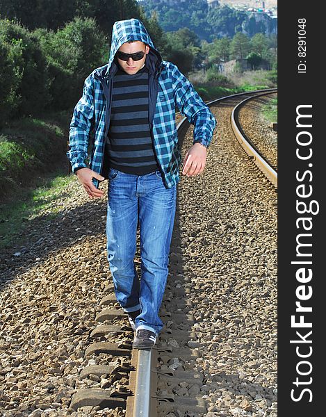 Man walking on a railway. Man walking on a railway