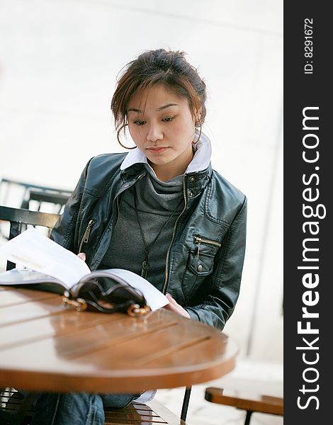 Young asian women reading book