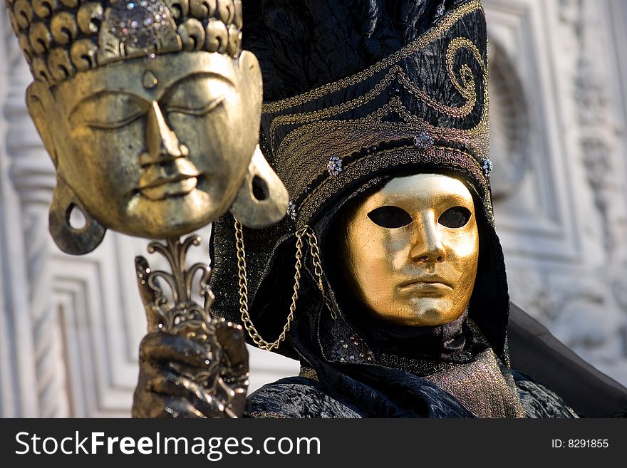 A mask posing in front of the San Zaccaria church in Venice during the 2009 carnival which lasted from February 13 to 24. A mask posing in front of the San Zaccaria church in Venice during the 2009 carnival which lasted from February 13 to 24.