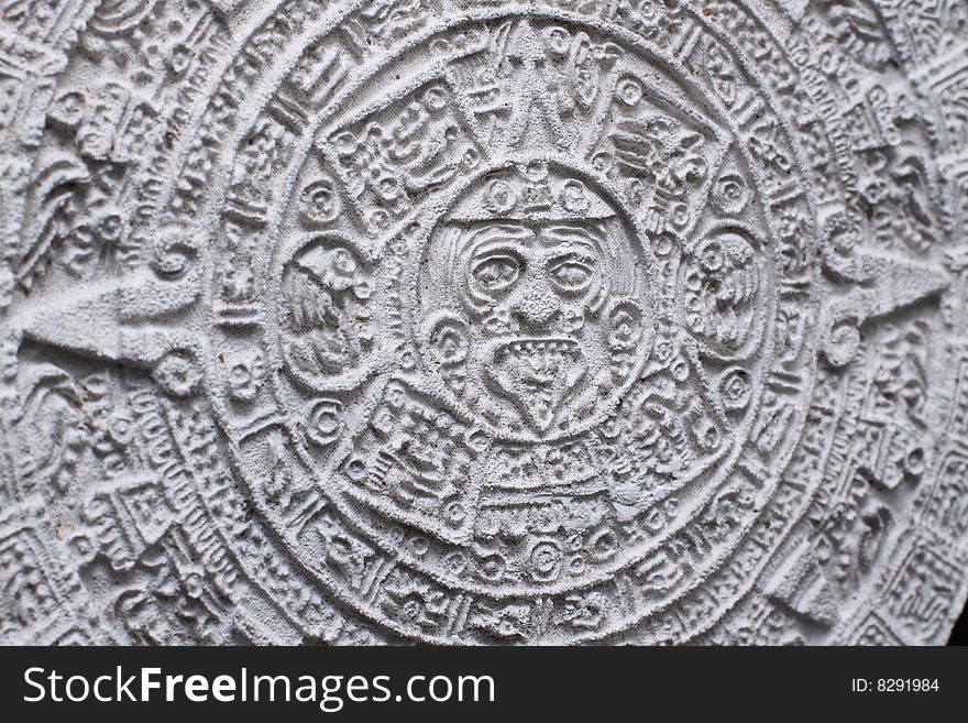 A close-up shot of  an Aztec calendar.