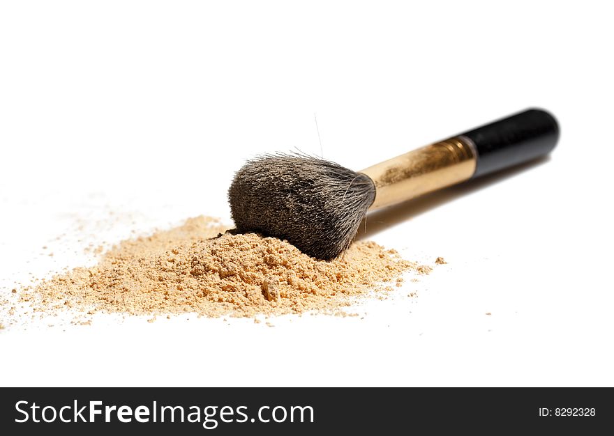 thick black brush and beige powder. thick black brush and beige powder