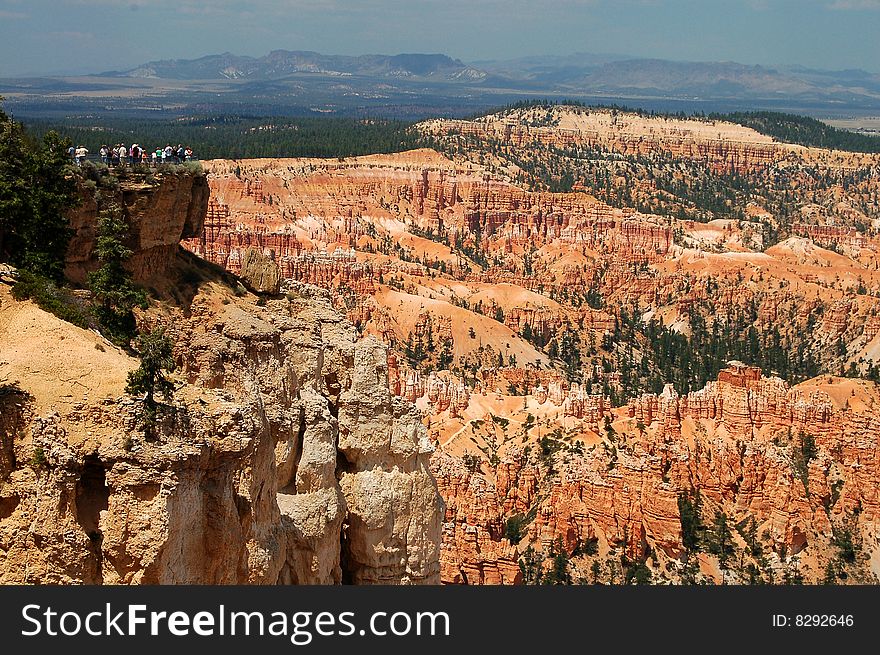 A group of people take in the beauty of Bryce Canyon National Park in Utah. A group of people take in the beauty of Bryce Canyon National Park in Utah.