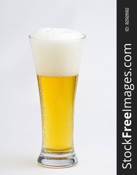 A fresh cold and tasty beer isolated