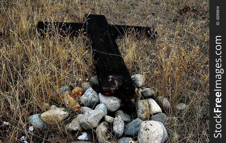 This cross was lying in an old cemetery  way back in the mountains in Montana. This cross was lying in an old cemetery  way back in the mountains in Montana.