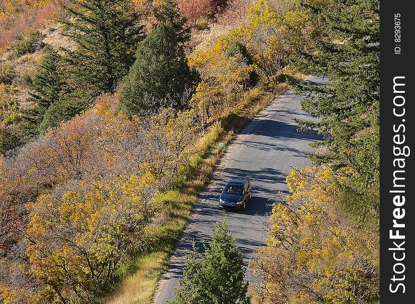 Afternoon autumn drive on a mountain road. Afternoon autumn drive on a mountain road