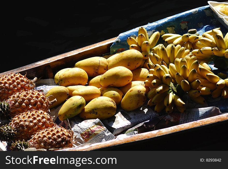 Thailand typical fruit at the floating market; view of different tropical fruit. Thailand typical fruit at the floating market; view of different tropical fruit.