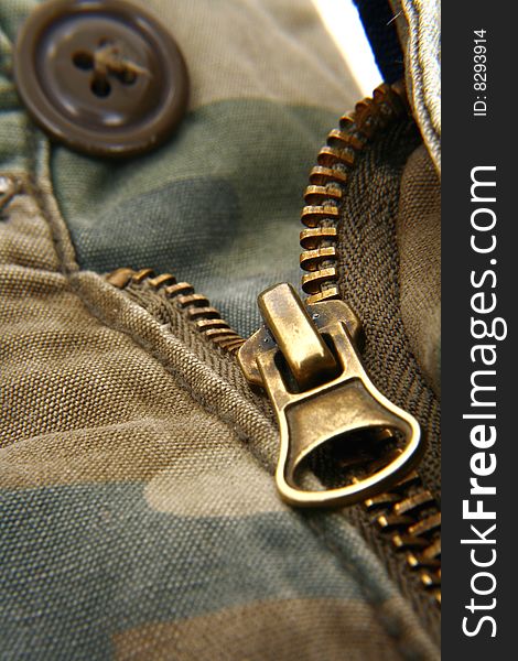 Zipper/fly in a pair of camouflage army pants